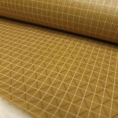 High-quality image showcasing my Coyote Brown 210D UHMWPE Gridstop Nylon fabric, emphasizing its lightweight, durable woven texture and unique waterproof properties. The image highlights the fabric's intricate UHMWPE fiber grid, its robust 210D denier thickness, and the dual protective coating – 1000mm PU on the back and DWR on the front. Ideal for visualizing the fabric's application in making resilient, weather-resistant outdoor gear like backpacks, fanny packs, and reinforcement areas.