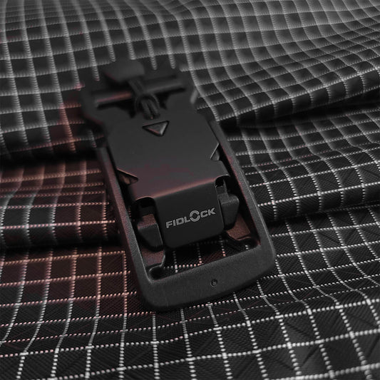 Fidlock 25mm V-Buckle with Black Flap + Pull Tab: A cutting-edge, magnetic buckle for premium gear, designed for 25mm straps. Features a durable stainless steel and PA66GF30 build, ensuring longevity and easy, one-handed operation.