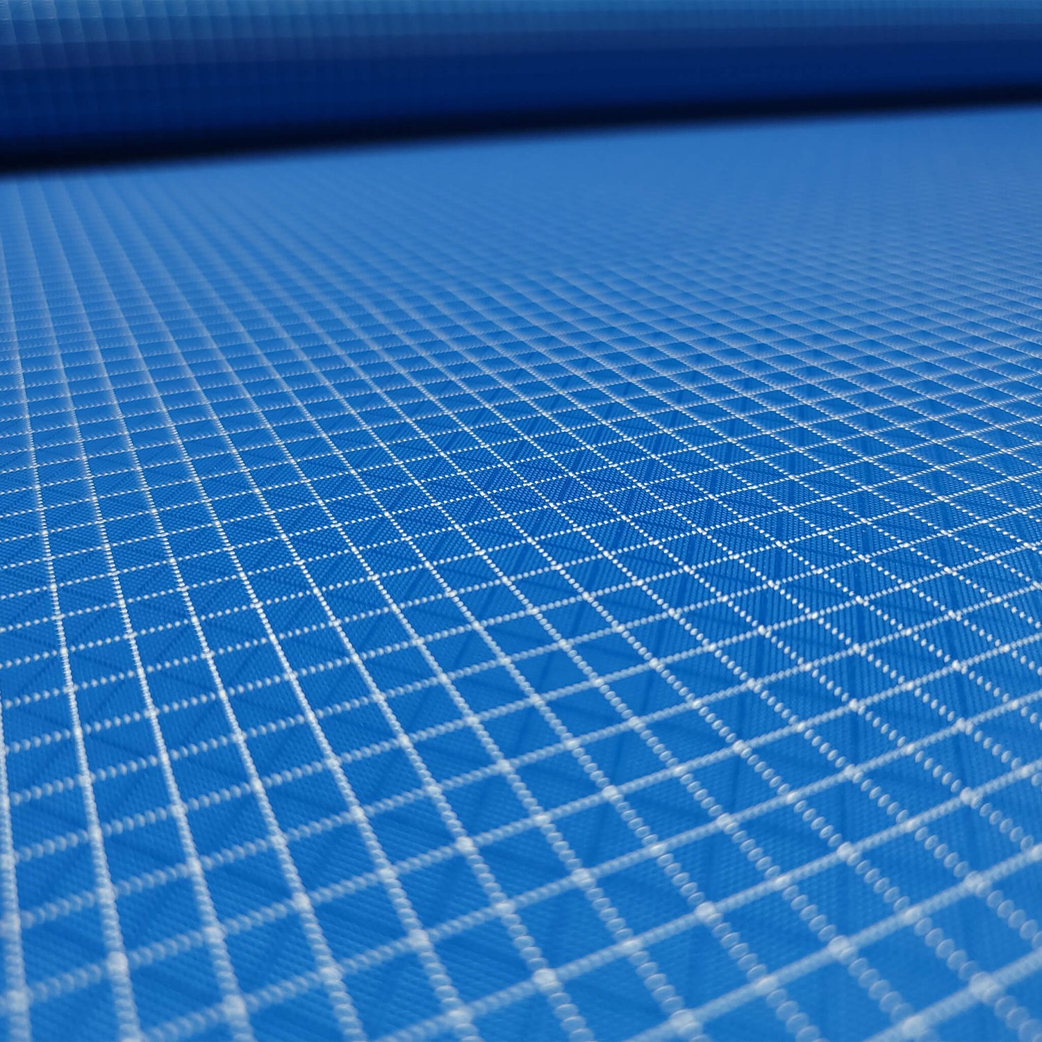 High-quality image showcasing my Sky Blue 210D UHMWPE Gridstop Nylon fabric, emphasizing its lightweight, durable woven texture and unique waterproof properties. The image highlights the fabric's intricate UHMWPE fiber grid, its robust 210D denier thickness, and the dual protective coating – 1000mm PU on the back and DWR on the front. Ideal for visualizing the fabric's application in making resilient, weather-resistant outdoor gear like backpacks, fanny packs, and reinforcement areas.