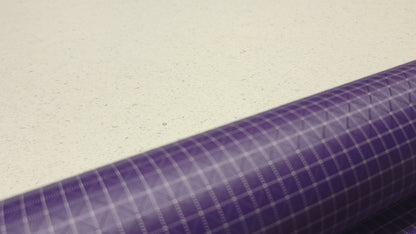 High-quality video showcasing my Grape Purple 210D UHMWPE Gridstop Nylon fabric, emphasizing its lightweight, durable woven texture and unique waterproof properties. The video highlights the fabric's intricate UHMWPE fiber grid, its robust 210D denier thickness, and the dual protective coating – 1000mm PU on the back and DWR on the front. Ideal for visualizing the fabric's application in making resilient, weather-resistant outdoor gear like backpacks, fanny packs, and reinforcement areas.