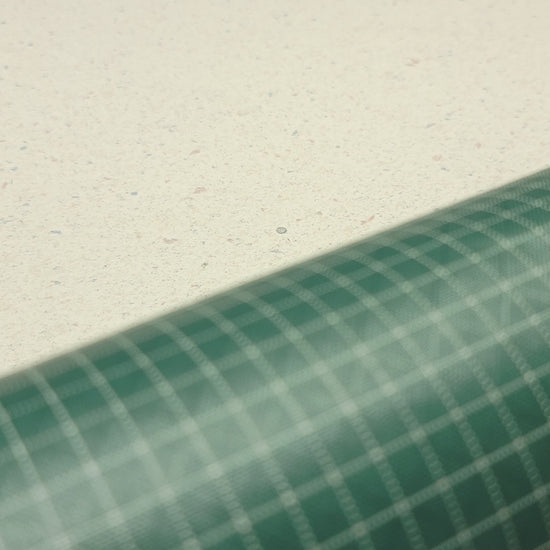 High-quality video showcasing my Pine Green 210D UHMWPE Gridstop Nylon fabric, emphasizing its lightweight, durable woven texture and unique waterproof properties. The video highlights the fabric's intricate UHMWPE fiber grid, its robust 210D denier thickness, and the dual protective coating – 1000mm PU on the back and DWR on the front. Ideal for visualizing the fabric's application in making resilient, weather-resistant outdoor gear like backpacks, fanny packs, and reinforcement areas.