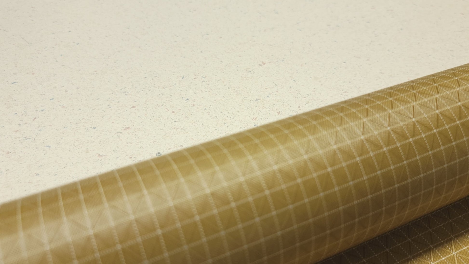 High-quality video showcasing my Coyote Brown 210D UHMWPE Gridstop Nylon fabric, emphasizing its lightweight, durable woven texture and unique waterproof properties. The video highlights the fabric's intricate UHMWPE fiber grid, its robust 210D denier thickness, and the dual protective coating – 1000mm PU on the back and DWR on the front. Ideal for visualizing the fabric's application in making resilient, weather-resistant outdoor gear like backpacks, fanny packs, and reinforcement areas.