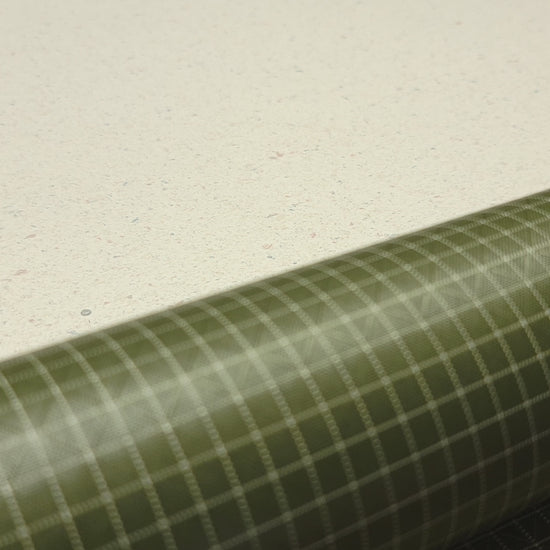 High-quality video showcasing my Olive Green 210D UHMWPE Gridstop Nylon fabric, emphasizing its lightweight, durable woven texture and unique waterproof properties. The video highlights the fabric's intricate UHMWPE fiber grid, its robust 210D denier thickness, and the dual protective coating – 1000mm PU on the back and DWR on the front. Ideal for visualizing the fabric's application in making resilient, weather-resistant outdoor gear like backpacks, fanny packs, and reinforcement areas.